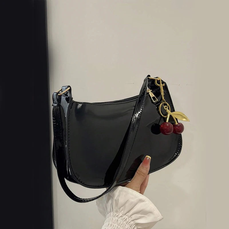 Saashi Women's PU Leather Versatile Fashion Solid Color Cherry Pendant Underarm Bag.